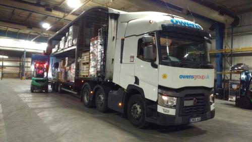 Renault T and double decker trailer tipping at a pallet hub